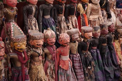 Panoramic shot of statues in market