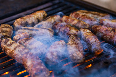 Close-up of meat on barbecue grill