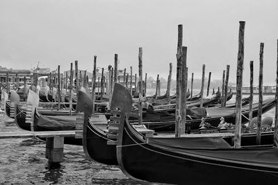 Boats moored at harbor