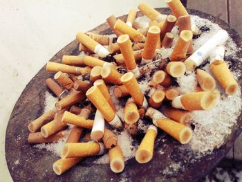 Close-up of cigarette on table