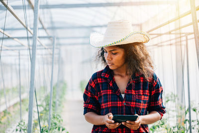 Young woman using mobile phone