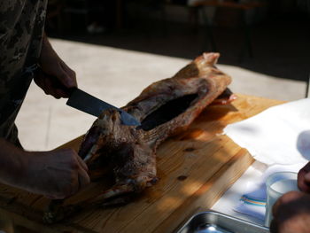 Close-up of man preparing food