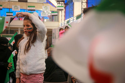 Girl protesting during war