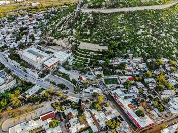 High angle view of street amidst buildings in city