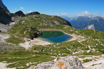 Scenic view of lake and mountains at dolomites