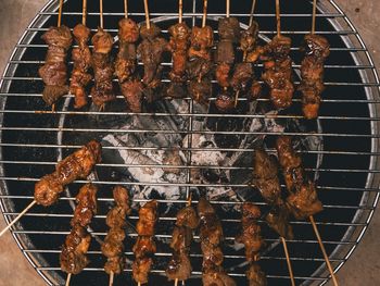 Close-up of meat on barbecue grill