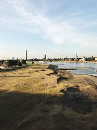 Scenic view of cityscape against sky