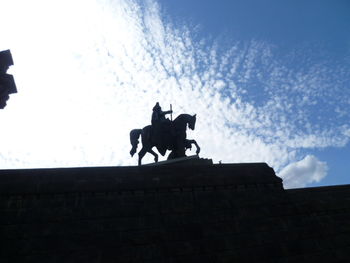 Low angle view of horse against sky