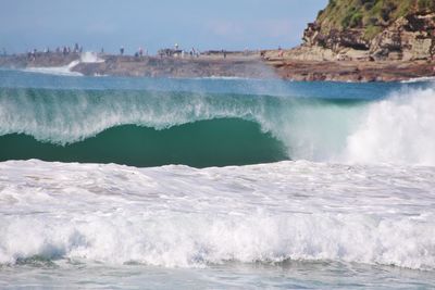 Waves splashing on rocks