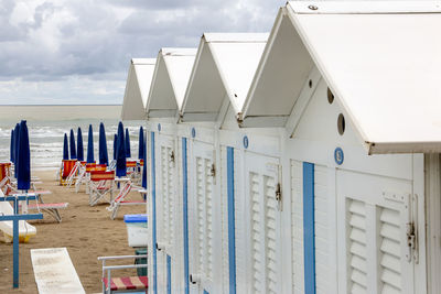 Built structure on beach against sky