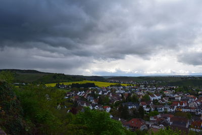 Aerial view of townscape against sky