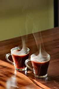 Coffee cups on table