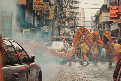 Panoramic view of cars on street