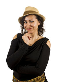 Portrait of young woman standing against white background