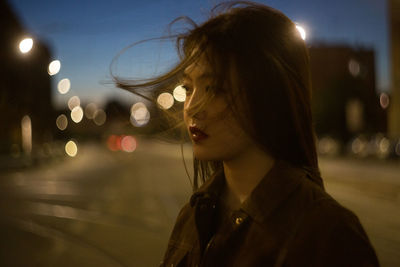 Close-up of woman looking away