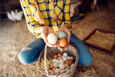 High angle view of man holding basket
