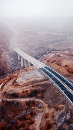 High angle view of road on landscape against sky