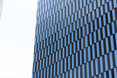 Low angle view of modern building against clear sky