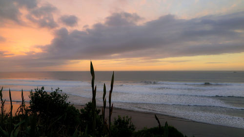 Scenic view of sea against sky during sunset