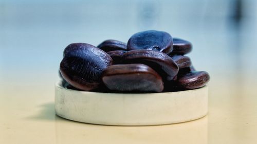 Close-up of black coffee on table