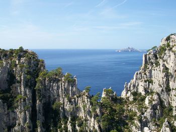 Scenic view of sea against blue sky