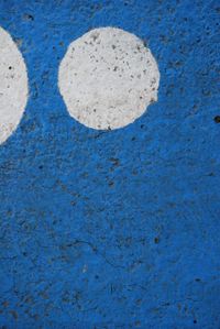 Close-up of heart shape on blue surface