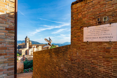 View of buildings against the wall