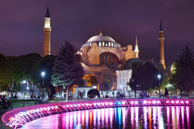 View of illuminated buildings at night