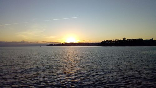 Scenic view of sea against sky during sunset