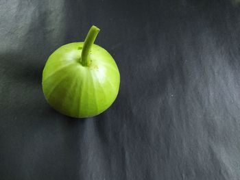 High angle view of apple on table