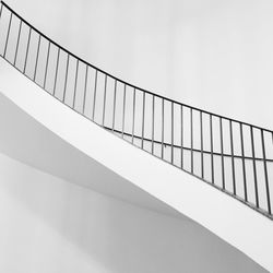 Low angle view of steps against white wall