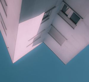 Low angle view of building against blue sky