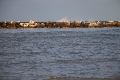 Scenic view of sea against clear sky