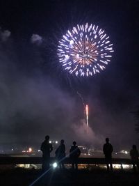 Firework display at night