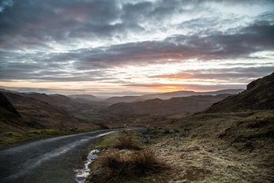 Scenic view of mountains at sunset