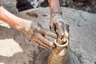 Man working in mud