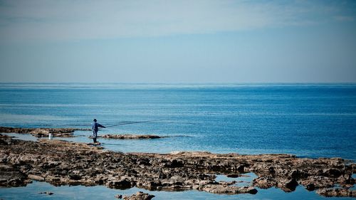 Scenic view of sea against clear sky