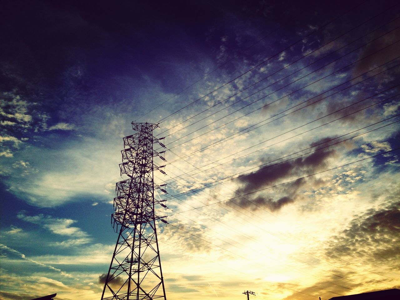 low angle view, sky, electricity pylon, silhouette, cloud - sky, fuel and power generation, power line, electricity, technology, power supply, cloudy, connection, cloud, sunset, nature, dusk, outdoors, no people, tall - high, tranquility