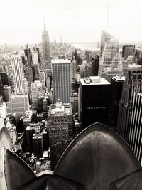 High angle view of buildings in city against sky