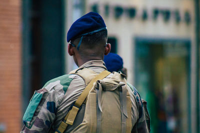 Rear view of man standing outdoors