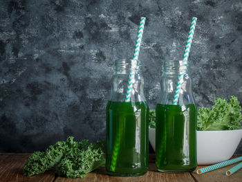 High angle view of bottles on table