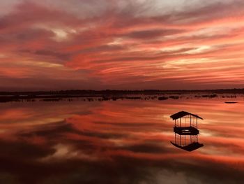 Scenic view of sea against dramatic sky