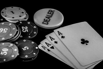 Close-up of objects on table against black background