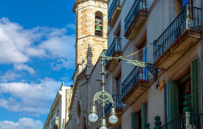 Low angle view of ornate building against sky