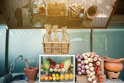 Preparation for somtum or thai green papaya salad with mirror on ceiling for topview display