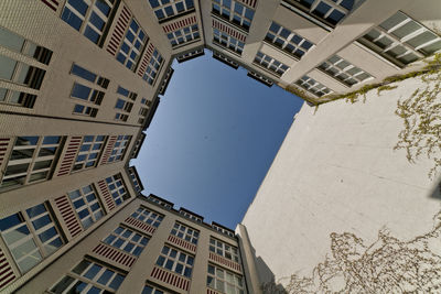 Low angle view of buildings against clear sky