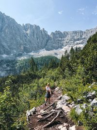 Woman hiking in the dolomite mountains