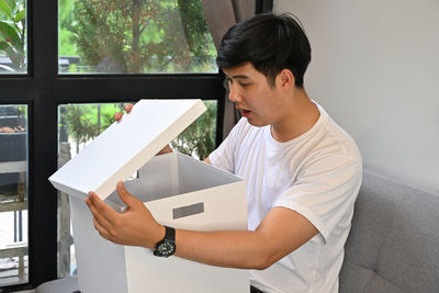 Young man using mobile phone