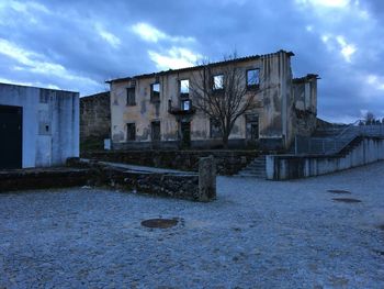 Abandoned building against sky