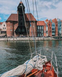 Nautical vessel in water against sky
